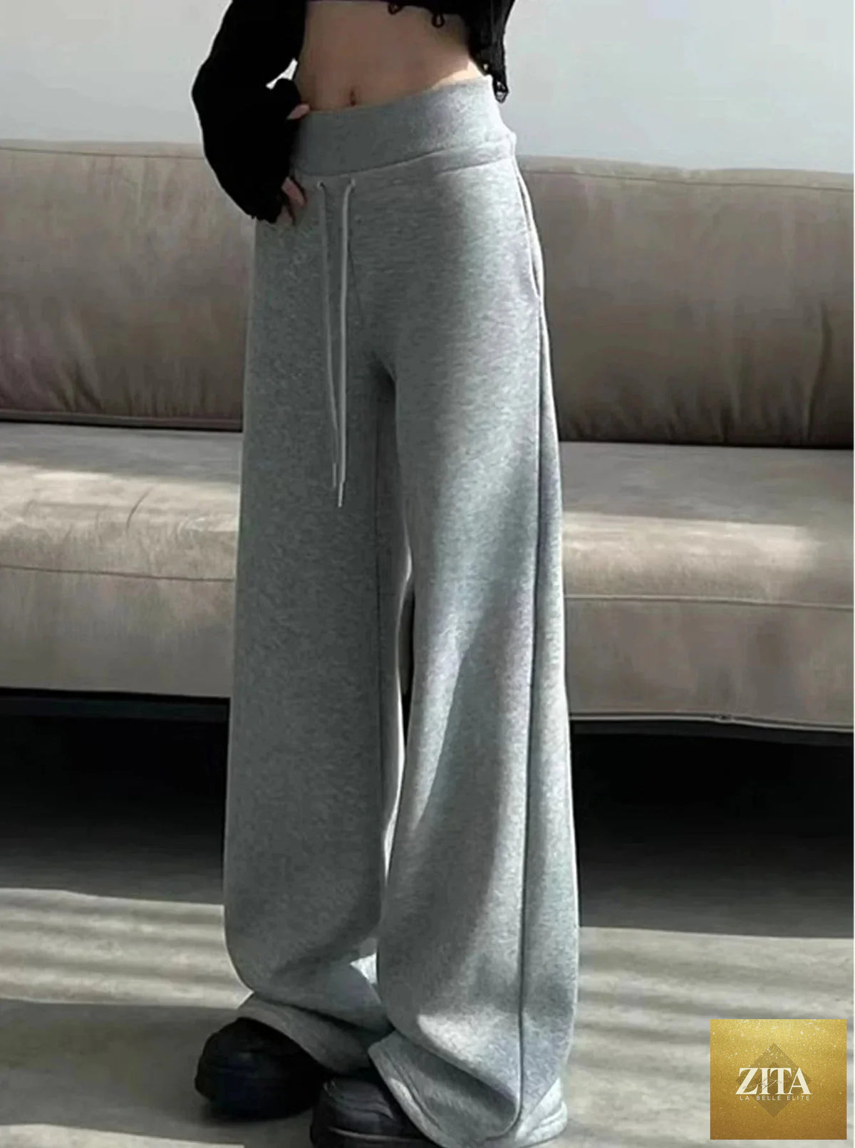 Gray high-waist loose wide-leg straight pants for women, casualwear by Zita La Belle Elite, showing relaxed fit and stylish design.