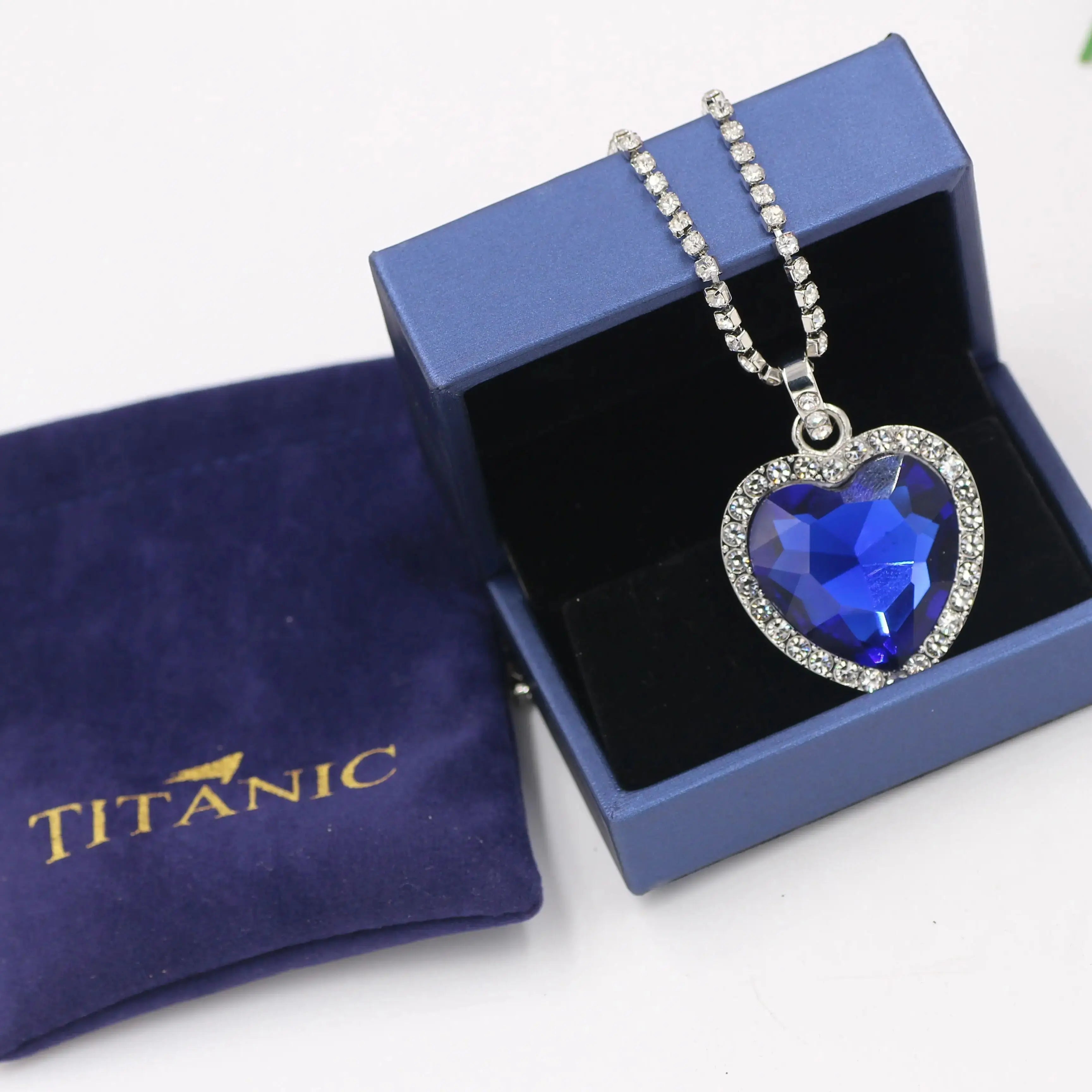 Blue Heart Love Forever Pendant Necklace by FLIPSTYLEZLLC with velvet bag, featuring a Titanic Heart of Ocean design.