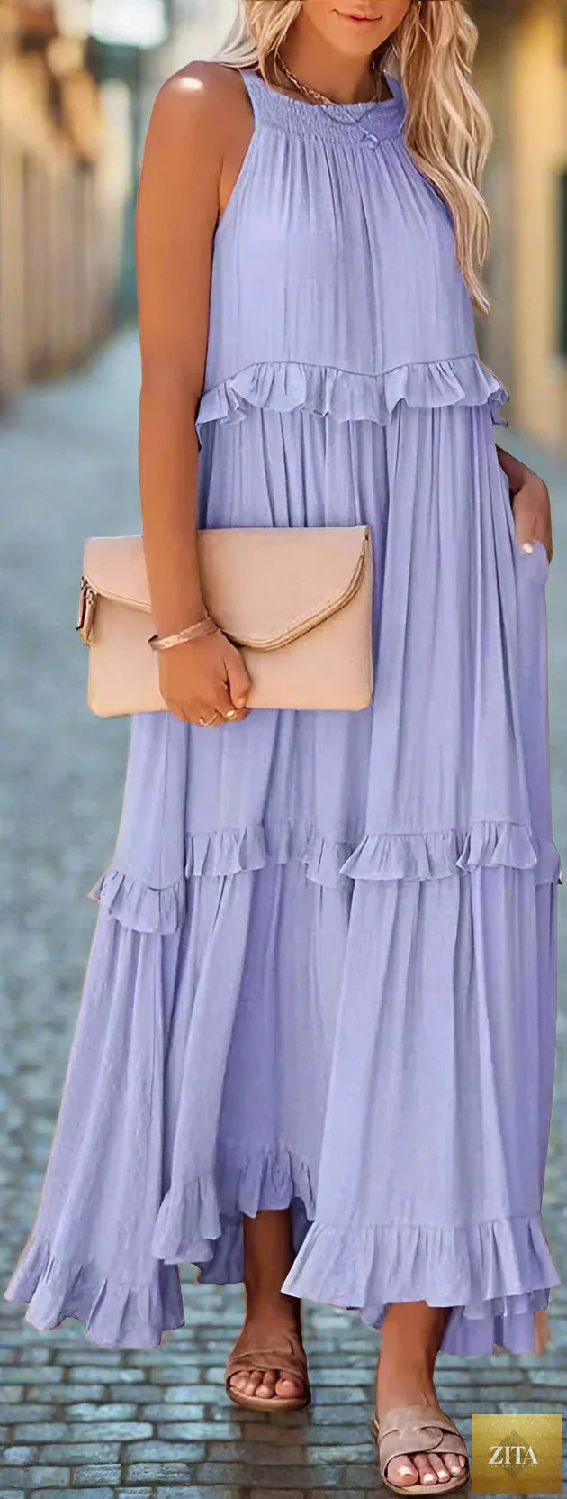 Elegant apricot ruffle maxi dress by Zita La Belle Elite, featuring flowing fabric and stylish casualwear design.