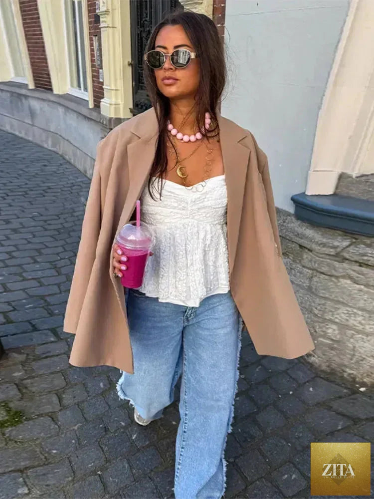 Women's Femstylo V-neck suit jacket with side buttons, long sleeves, solid color, oversized fit, and pocket cuffs.