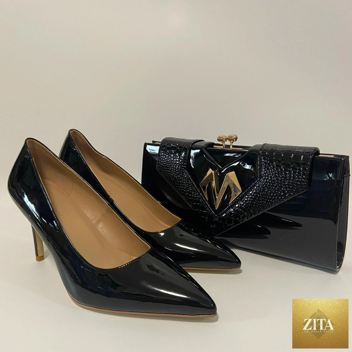 Elegant high heel shoes and matching bag by EdleessFashion, displayed together in a stylish, coordinated fashion set.