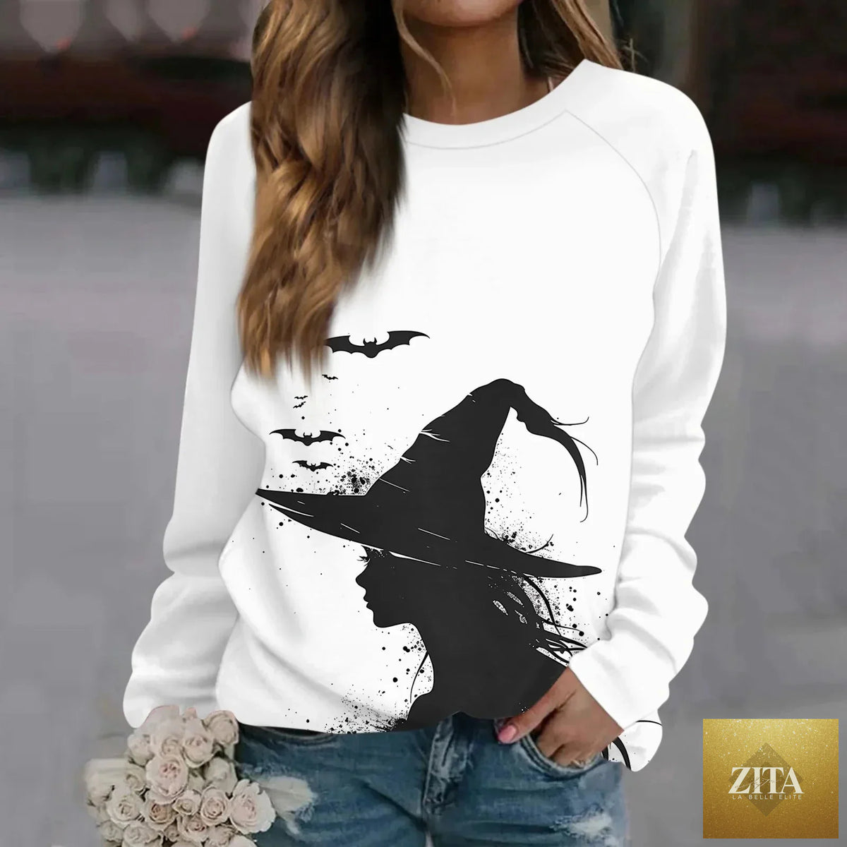 Vintage pumpkin print long sleeve T-shirt from Zita La Belle Elite featuring Halloween graphic design, perfect for streetwear style.