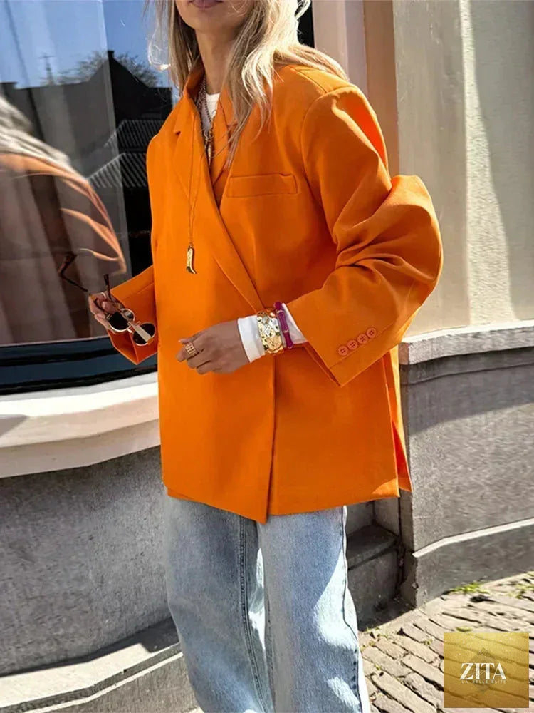 Women's Femstylo V-neck side-button suit jacket with long sleeves, solid color, oversized fit, and pocket cuffs.