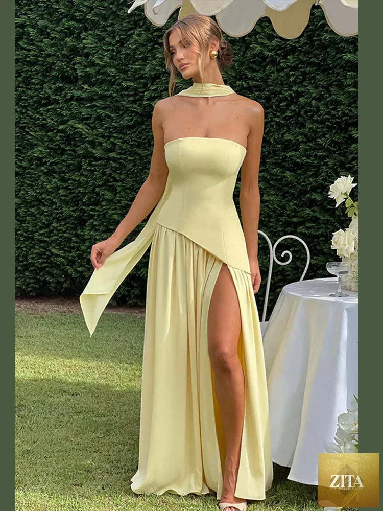 Elegant solid spliced maxi dress for women, strapless sleeveless design with a slit, perfect for summer holidays and parties.