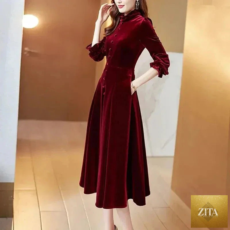 Wine red velvet women’s maxi dress with long sleeves, elegant and flowing, by SMinvite, LLC, perfect for formal occasions.