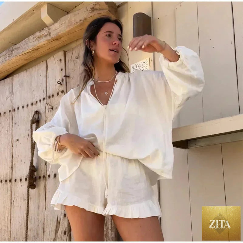Women's solid cotton linen ruffle shorts suit with V-neck long sleeves and drawstring waist, featuring a loose, comfortable two-piece set.