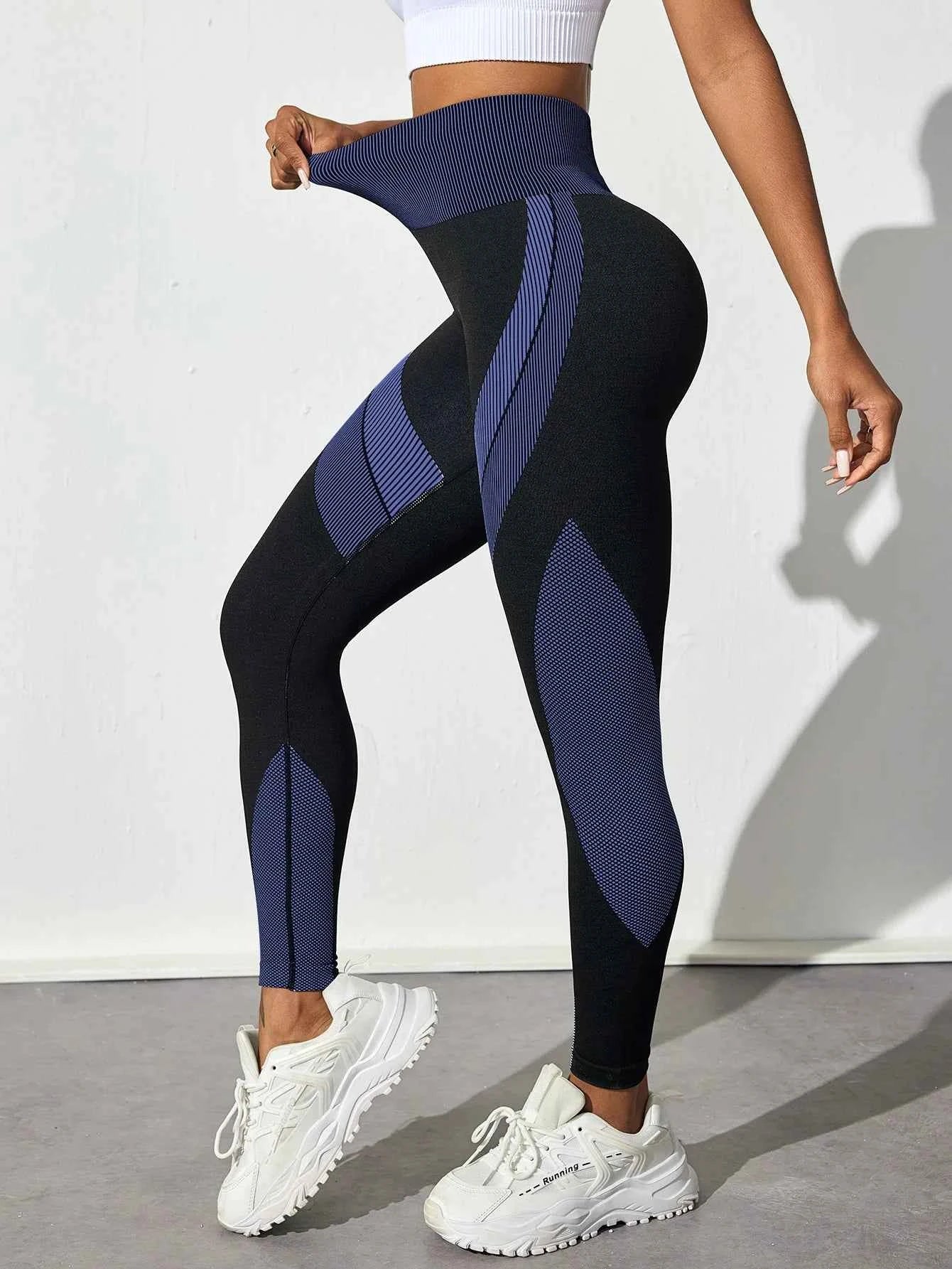High waist seamless yoga leggings by THRIXINE, featuring a snug fit and stretchy fabric, suitable for active wear and workouts.