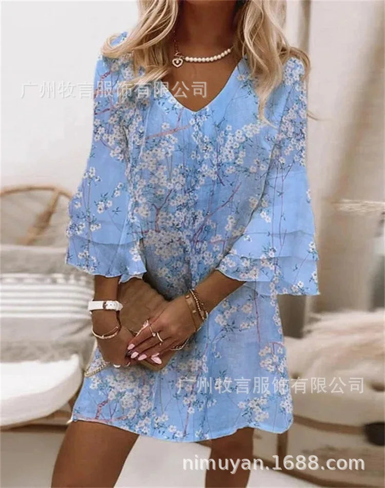 Plus size women's flared dress with butterfly sleeves and loose waist, stylish and elegant for a chic summer look.