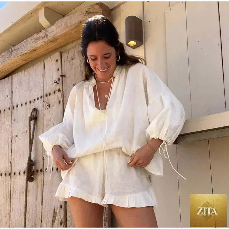 Women's solid cotton linen ruffle shorts suit with V-neck long sleeves and drawstring waist, two-piece loose set, perfect for casual wear.