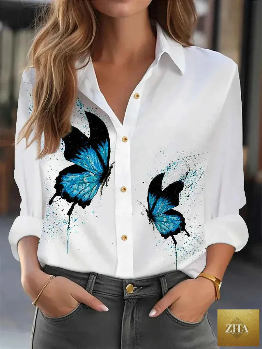 Elegant loose printed blouse for women by THRIXINE, featuring a stylish active top with a comfortable fit and vibrant pattern.