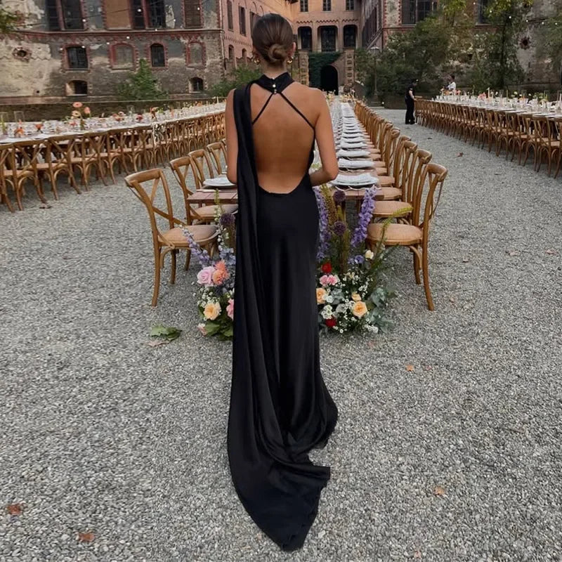 Femstylo backless lace-up maxi dress with sleeveless ribbon detail, elegant party gown for evening occasions.