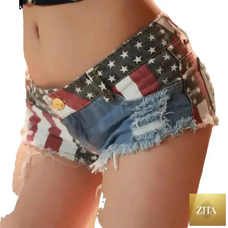 Women's low-rise denim shorts featuring an American flag print, ripped details, and a mini hot summer style by FLIPSTYLEZLLC.