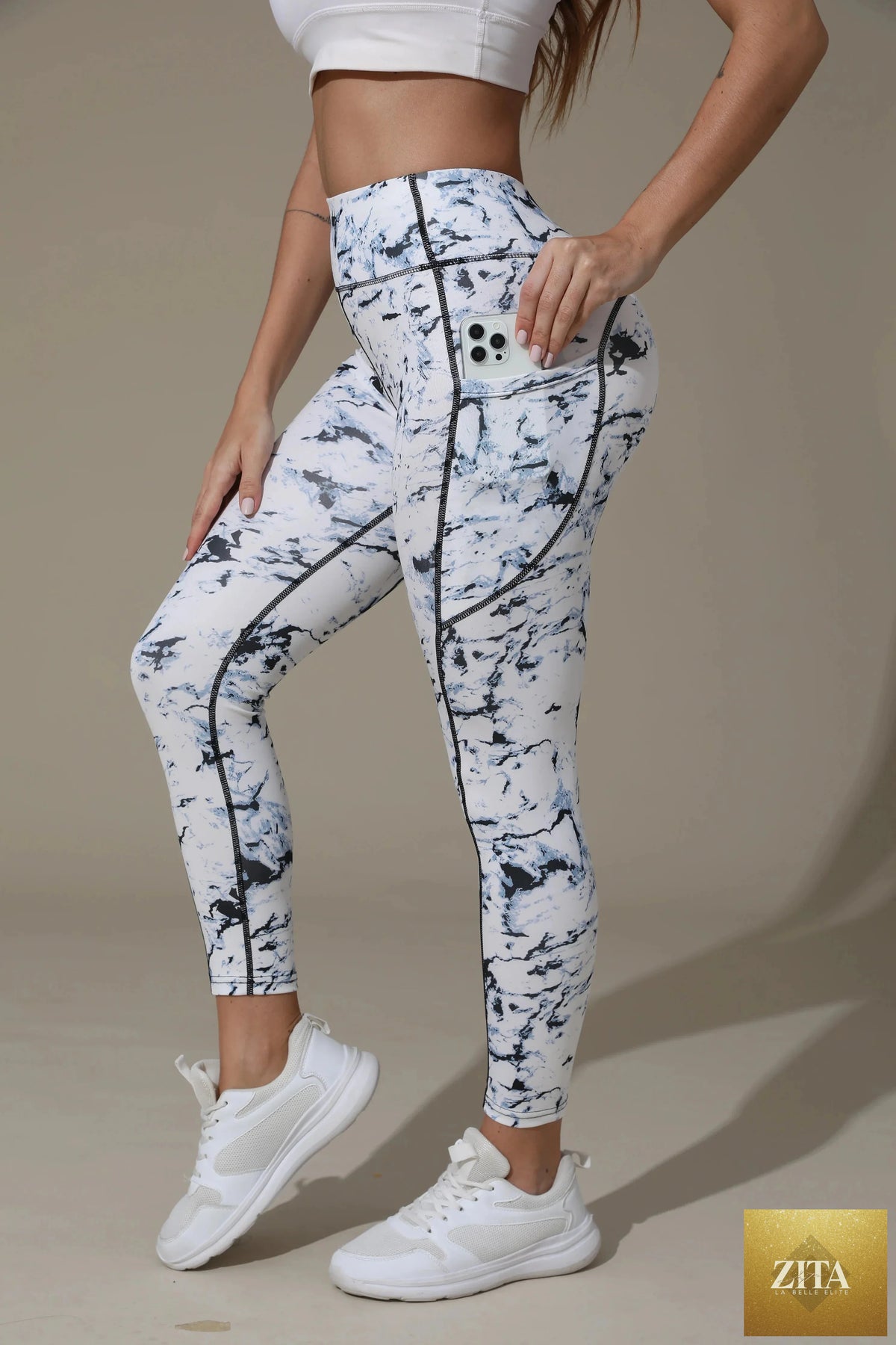 Printed high-waist pocket fitness leggings for women by FitiqueFit, featuring a colorful pattern and comfortable fit.
