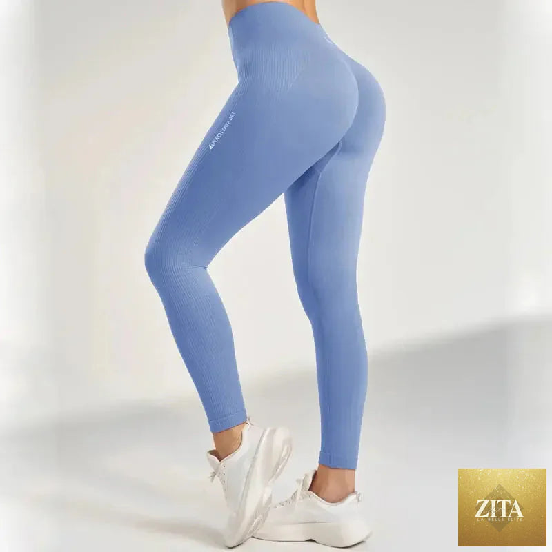 Women's tummy control yoga leggings by 24 Hour Sport, stretchy black leggings with high waistband for comfortable fit and support.