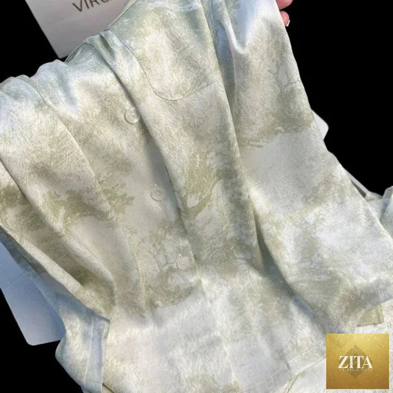 Ice silk women’s pajama set by SMinvite featuring a button cardigan and matching lapel top in a two-piece design.