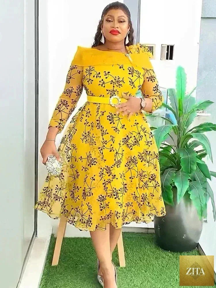 Elegant women’s dashiki print midi robe by Femstylo featuring African-inspired evening gown design and vibrant Dubai fashion style.
