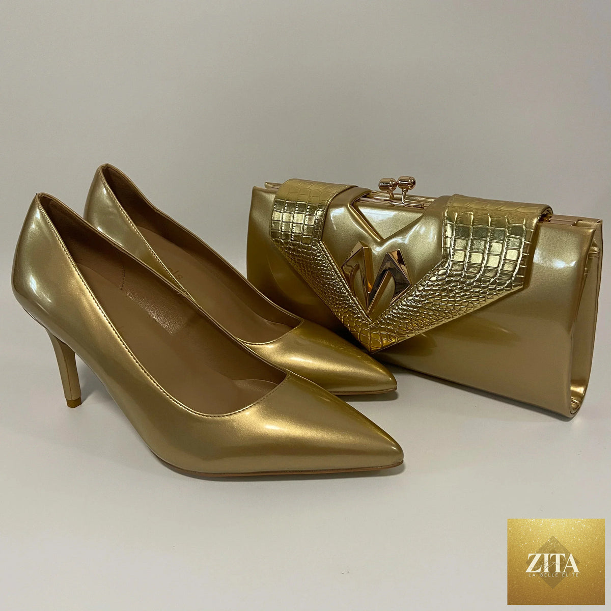 Elegant high heel shoes and matching bag from EdleessFashion, featuring stylish design and sophisticated accessories.