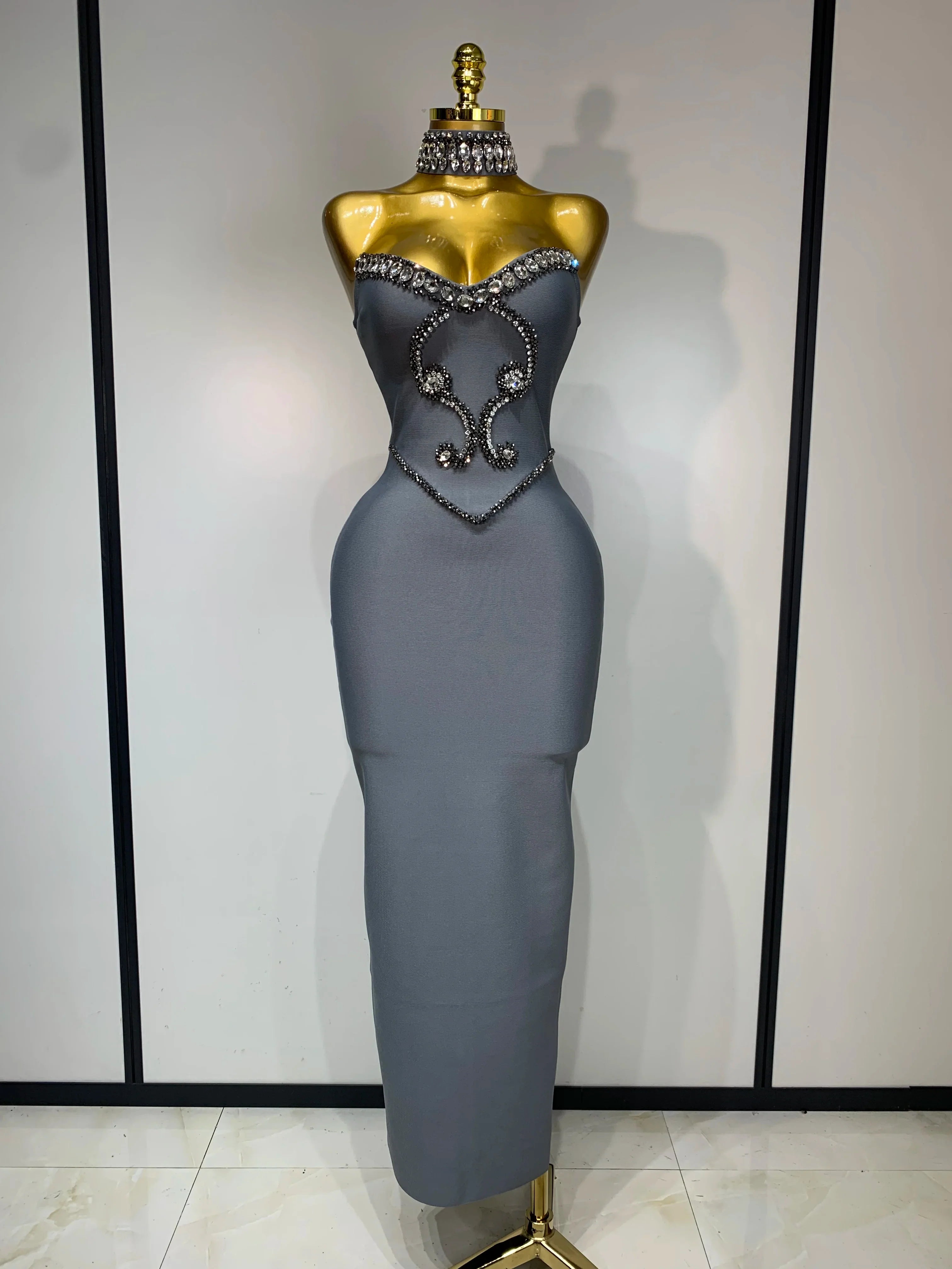 Elegant strapless beaded bandage dress by FLIPSTYLEZLLC featuring a necklace, perfect for evening parties and special occasions.
