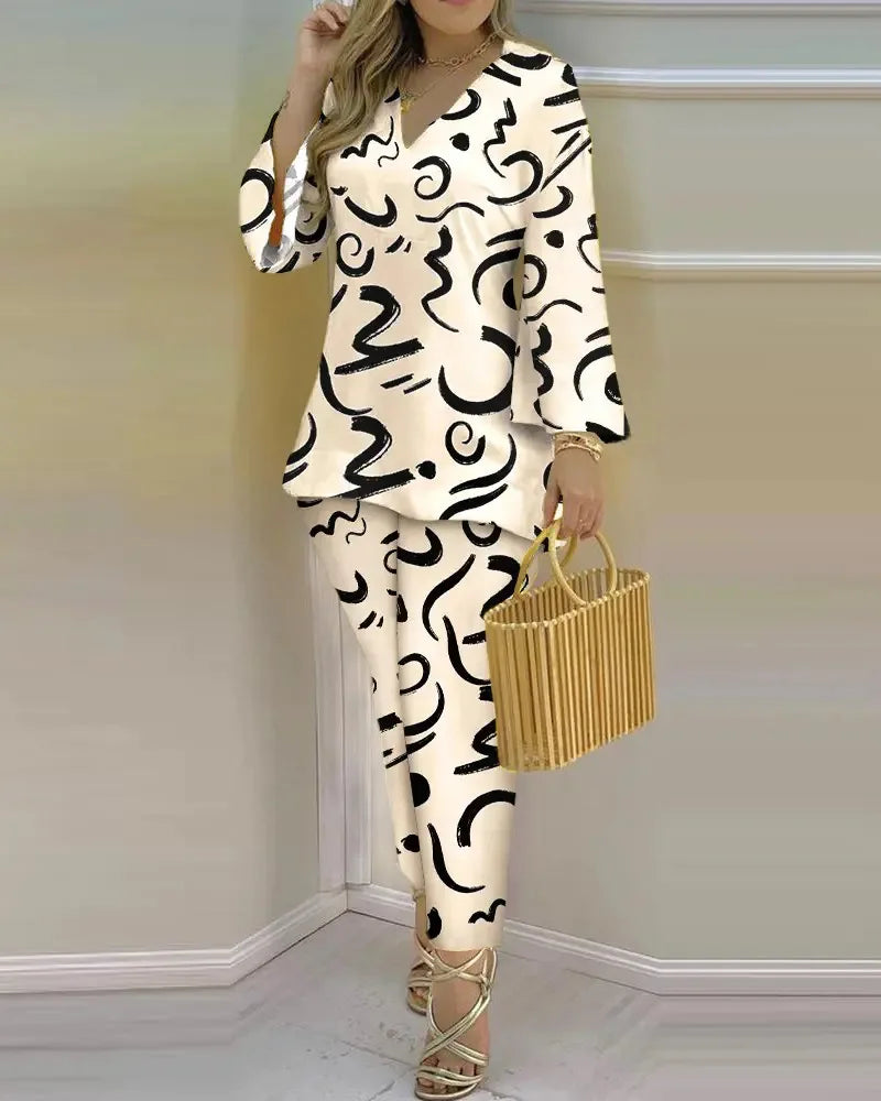 Women’s long sleeve V-neck two-piece set with printed polyester fabric, stylish and comfortable for casual wear.