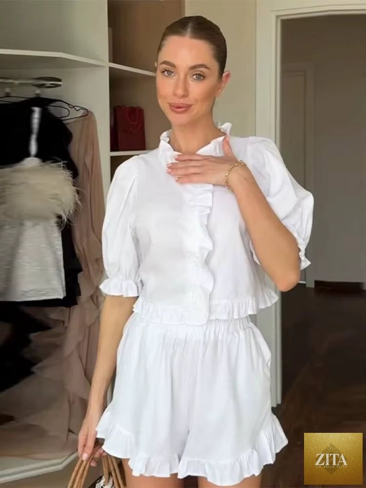 Women's ruffled linen-blend cropped blouse and shorts set by Zita La Belle Elite, featuring a stylish, comfortable summer outfit.