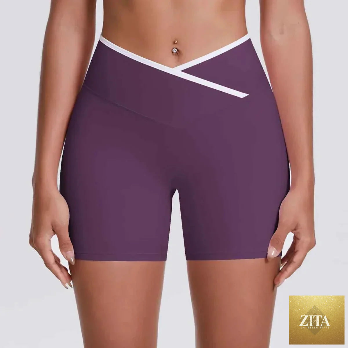 V-shaped waist women's yoga fitness shorts by THRIXINE, showing close-up of the black active shorts with V-shaped waistband.