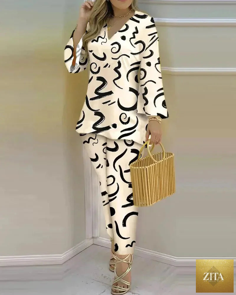 Women's long sleeve V-neck polyester two-piece set featuring printed design, stylish and comfortable for casual wear.
