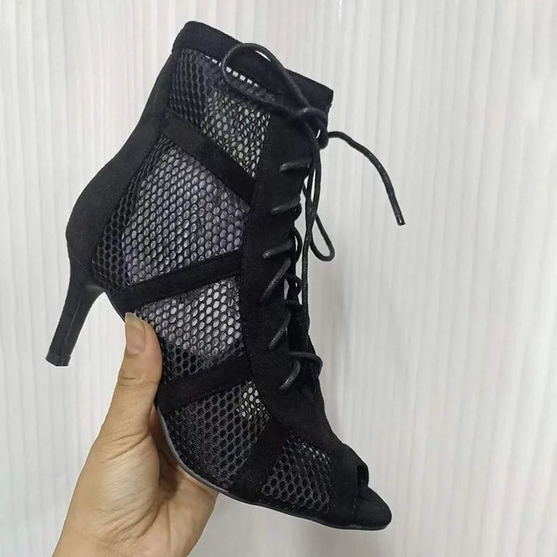 Black lace-up women's dancing sandals with open toes, ankle straps, thin heels, and hollow out design for stylish comfort.