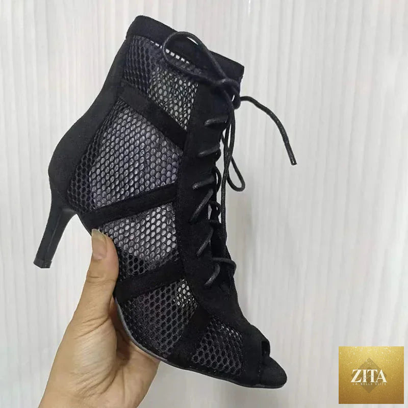 Black lace-up open-toe women’s dancing sandals with thin heels, ankle strap, and hollow out design for comfort and style.