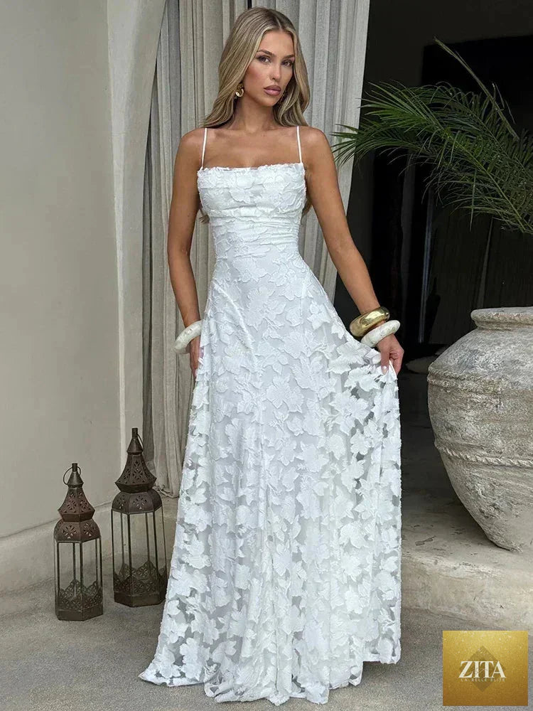 Femstylo backless spaghetti strap maxi dress for women, sleeveless lace-up evening gown with off-shoulder design, suitable for parties.