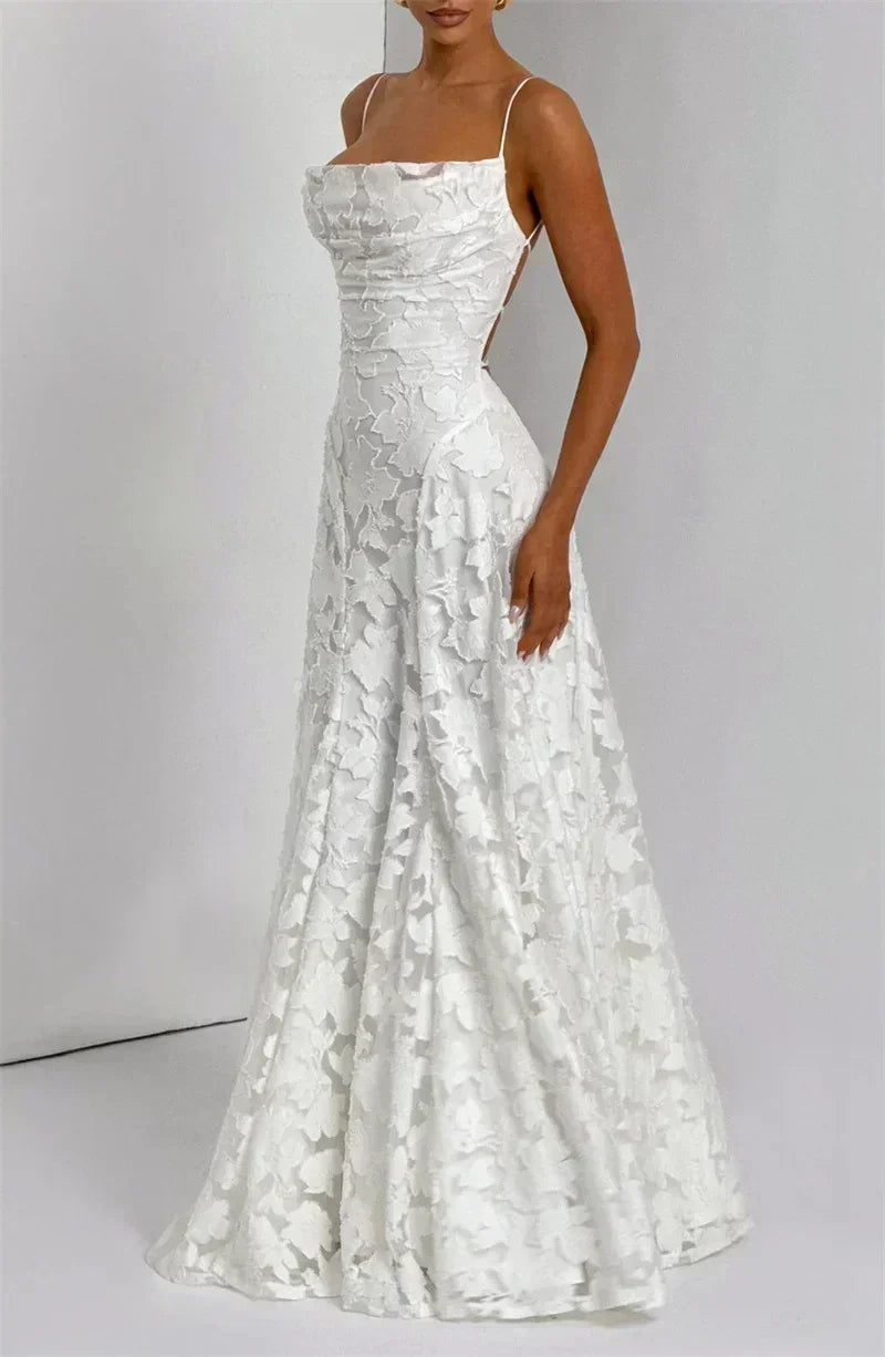 Femstylo spaghetti strap backless maxi dress for women, off-shoulder lace-up evening gown with sleeveless design for parties or clubs.