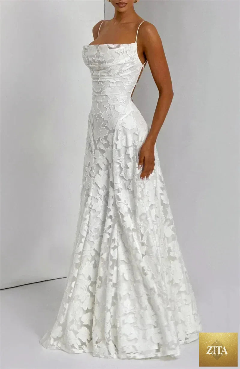 Femstylo spaghetti strap backless maxi dress for women, off-shoulder lace-up evening gown with sleeveless design for parties or clubs.