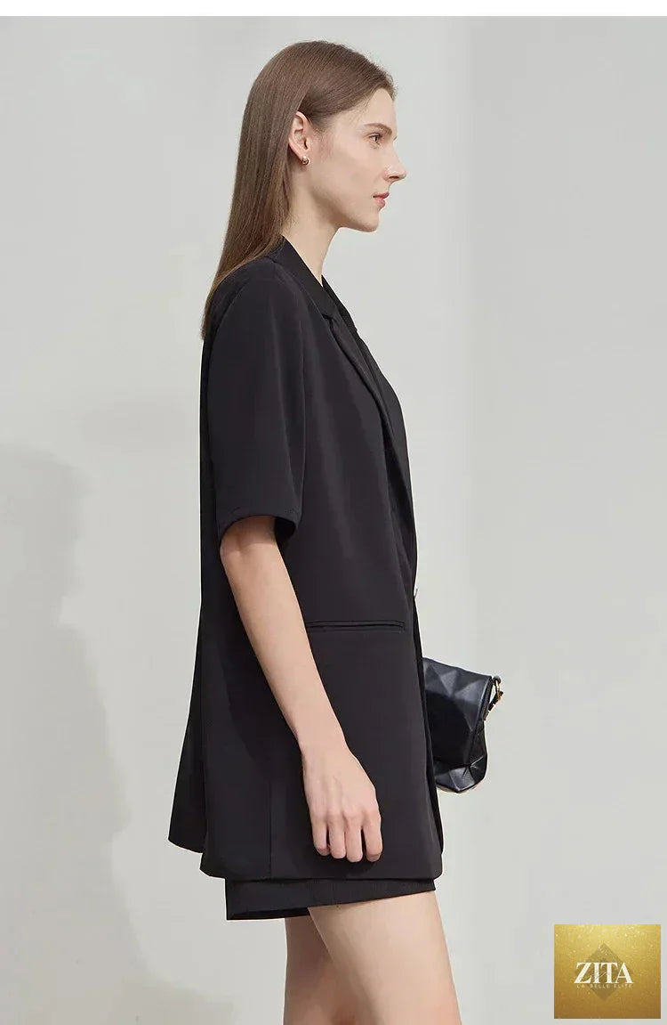 Femstylo Amii Women's minimalist short sleeve blazer with notched lapel, contrast patchwork, and one button closure, summer 2025 style.
