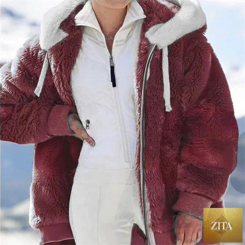 Women’s winter faux fur jacket with hood, plush fleece lining, zipper closure, and casual style for warmth and comfort.