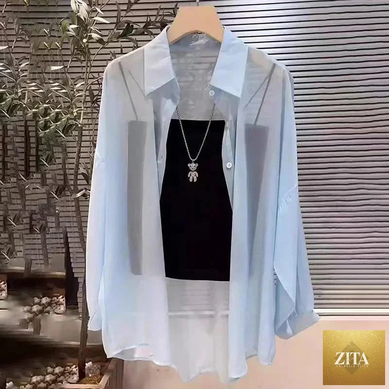 Plus size summer ice silk breathable sunproof shirt from Trendy Attic Store01, lightweight and comfortable for hot weather.