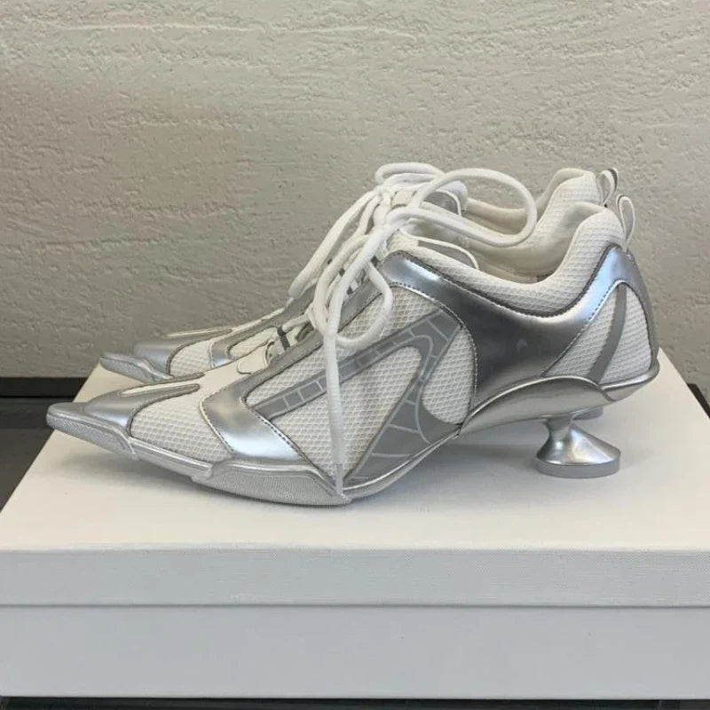 Silver lace-up women's sports heels with pointed toes, mesh design, and elegant punk style for fashionable women.