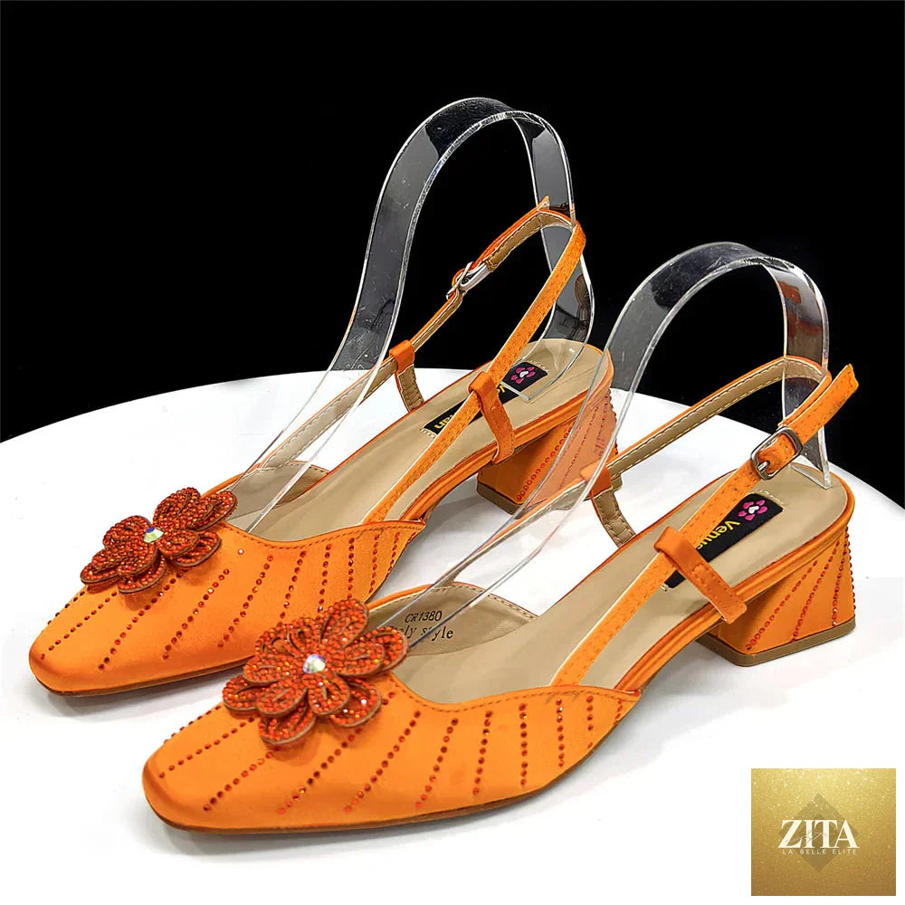 Elegant Italian fashion women's heels and clutch bag set by EdleessFashion, featuring luxurious shoes and stylish clutch for sophisticated looks.