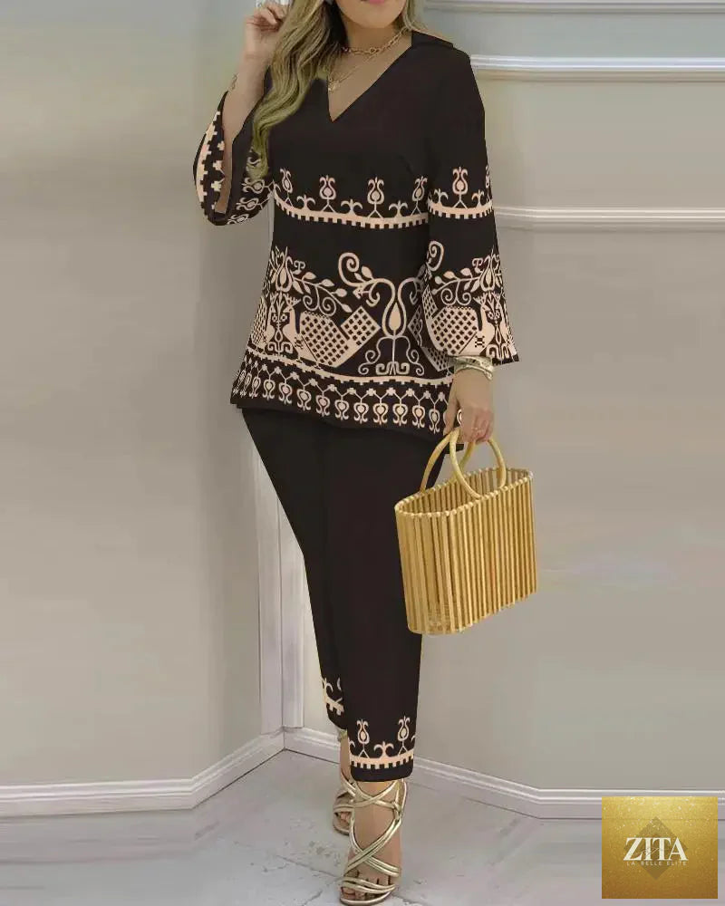 Women’s long sleeve V-neck two-piece set in printed polyester, stylish casual outfit from Trendy Attic Store01.