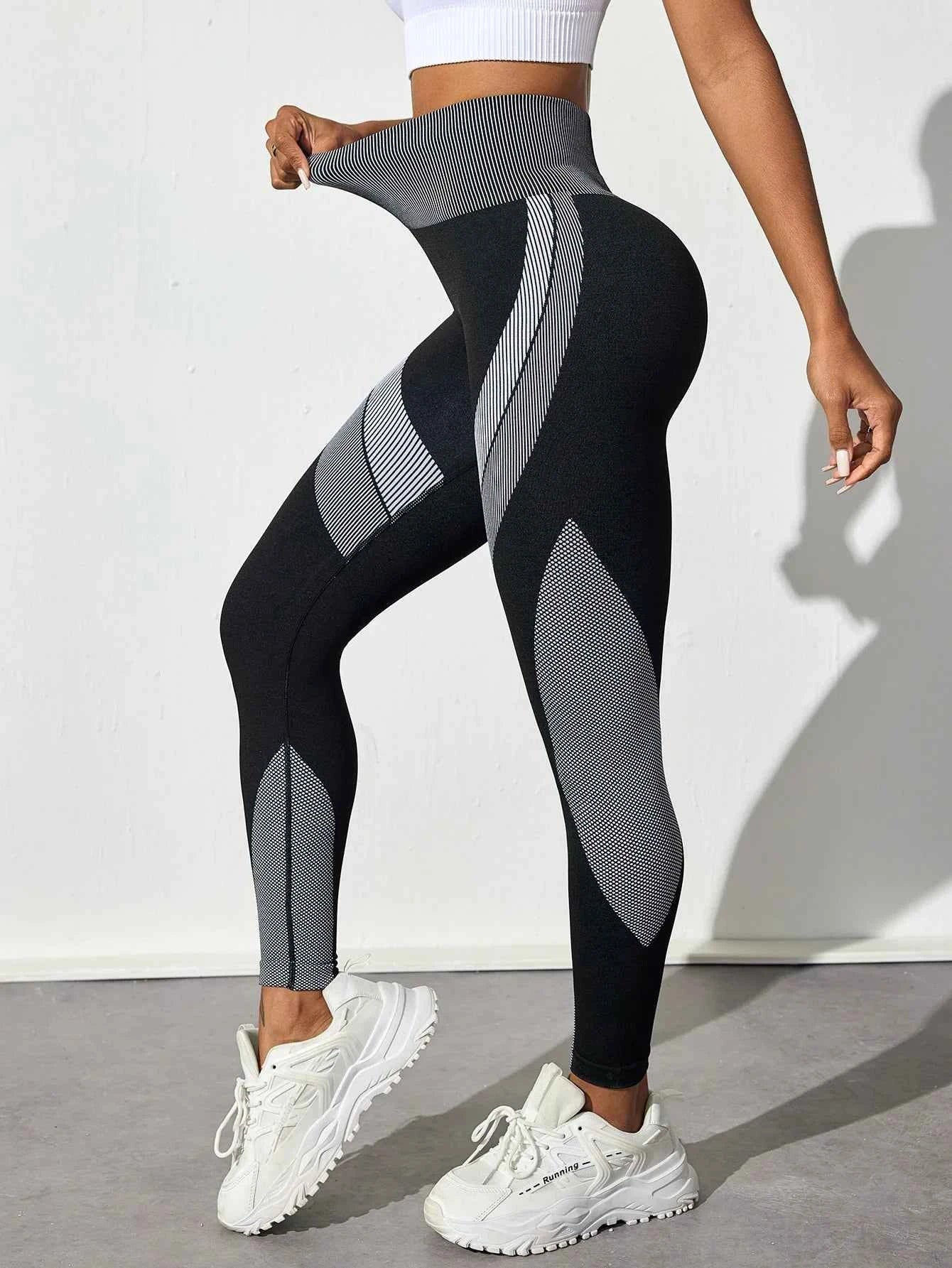 THRIXINE WANAYOU high waist seamless yoga leggings in black, showing their stretchy, form-fitting design and smooth fabric.