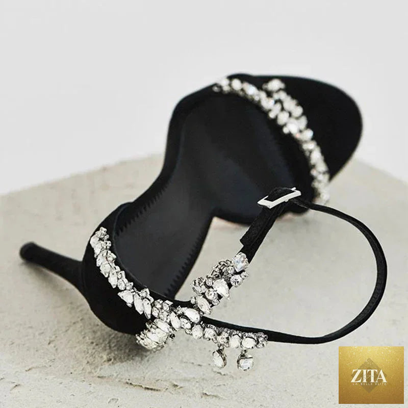Black women's stiletto high heels with rhinestone embellishments, open toe, round toe, and slotted buckle for versatile celebrity style.