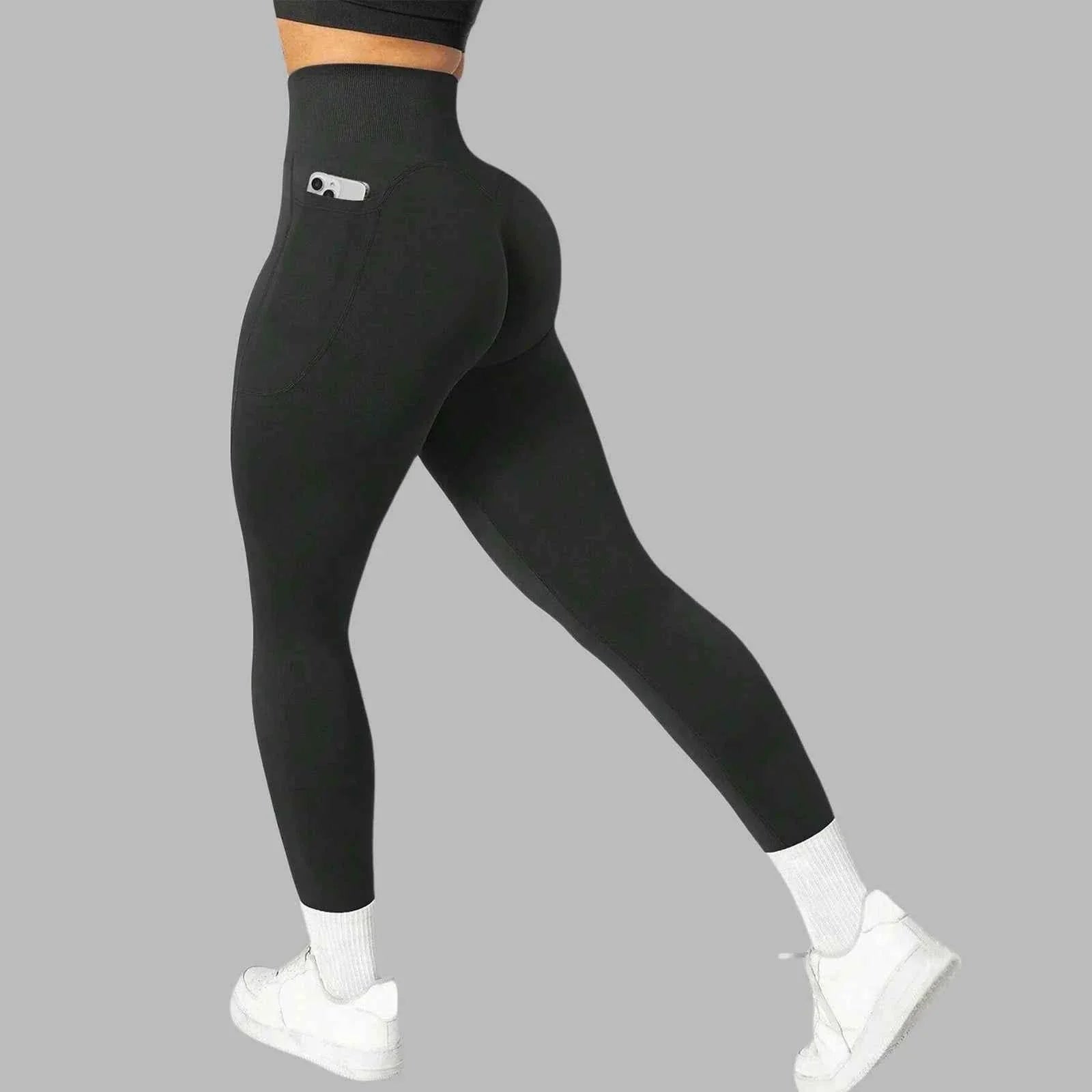 Women's seamless pocket yoga leggings by THRIXINE, featuring a high waistband, breathable fabric, and convenient side pockets.