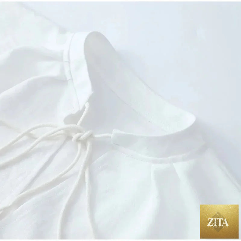Women's solid cotton linen ruffle shorts suit with V-neck long sleeves and drawstring waist, casual two-piece set.