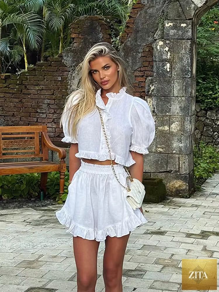 Women's ruffled linen-blend cropped blouse and shorts set by Zita La Belle Elite, featuring a stylish, comfortable summer outfit.