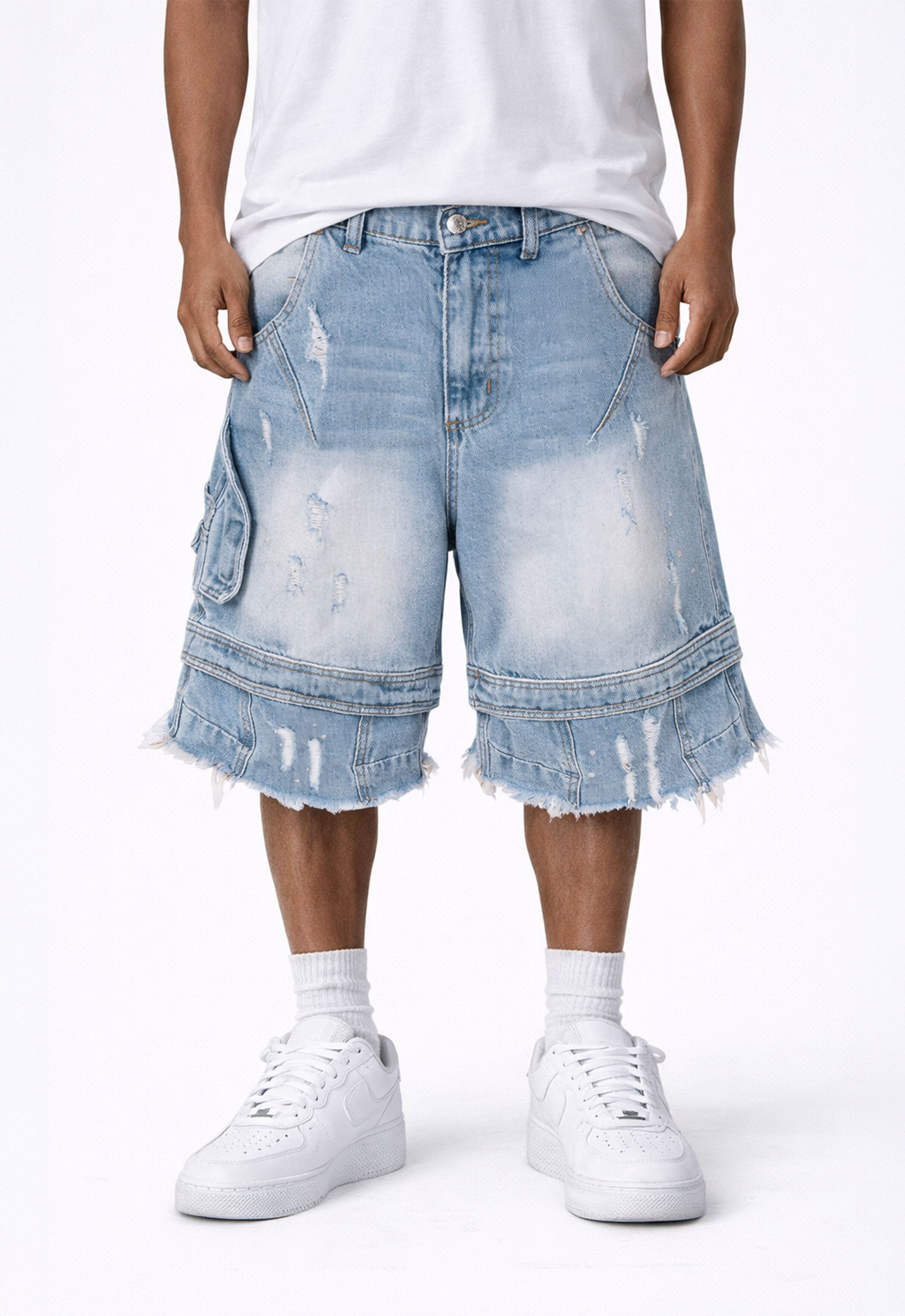 Light blue distressed cargo shorts from UNDEVELOPED with multiple pockets and a casual fit.