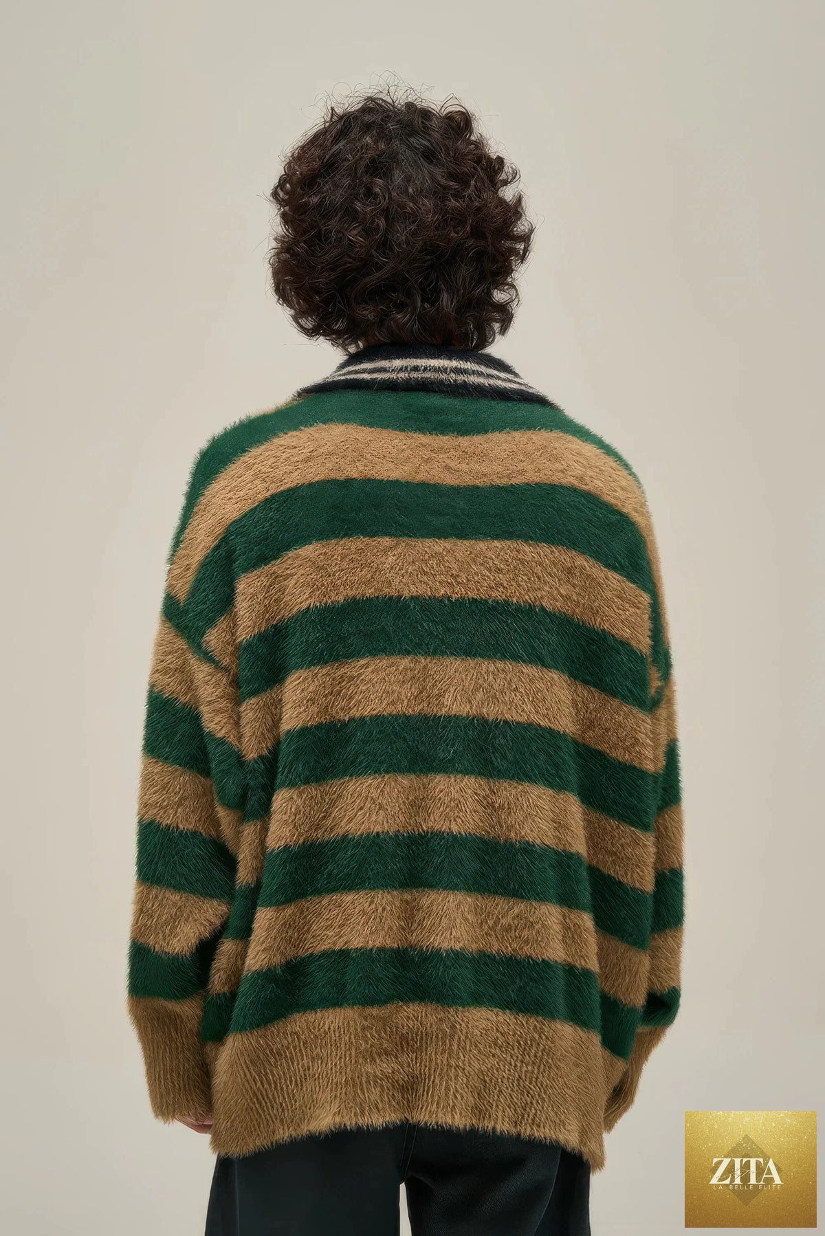 American style oversized knit sweater by 4inme, soft chunky fabric, relaxed fit with ribbed cuffs and neckline, in neutral tone.
