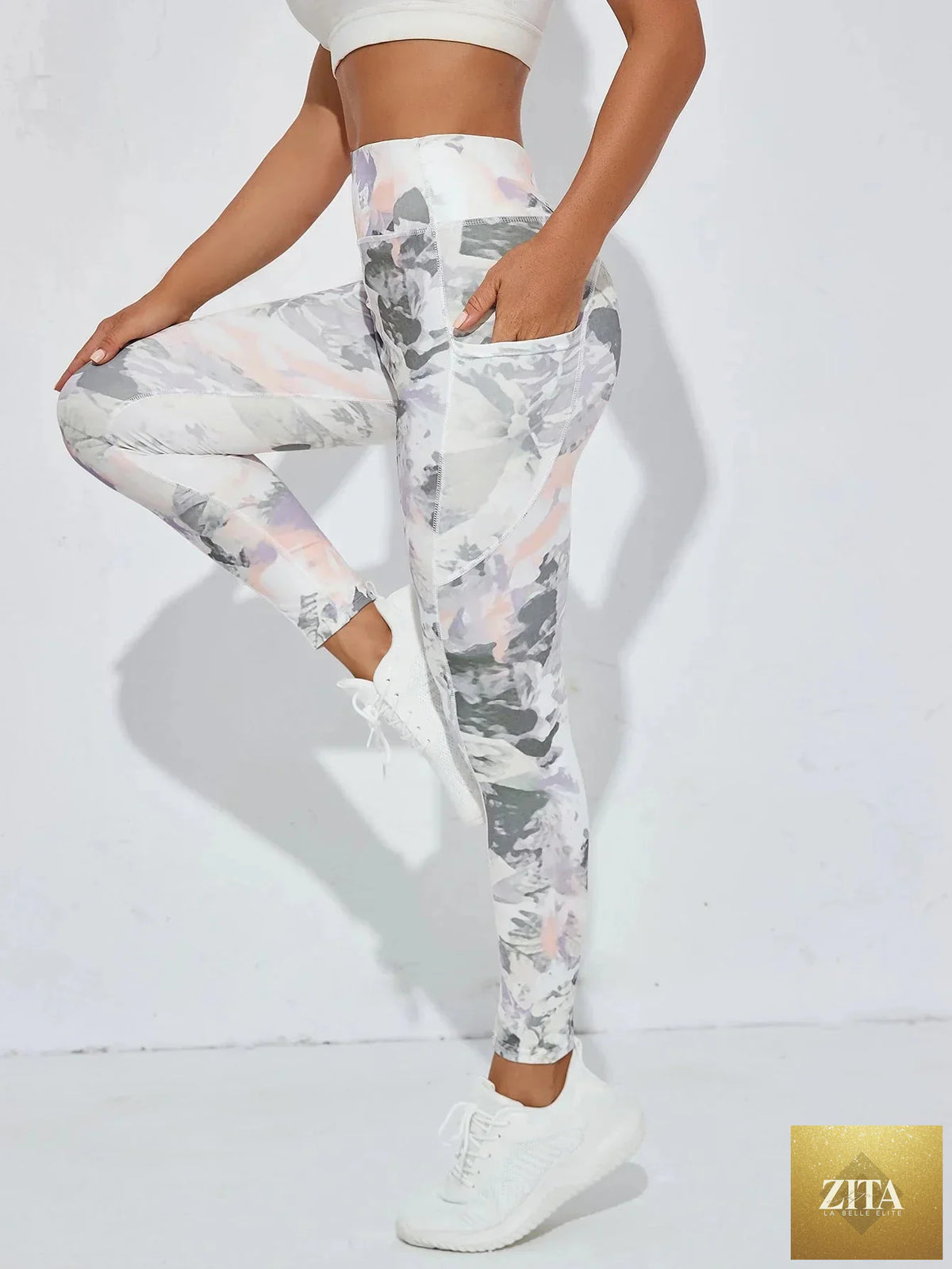 Printed high-waist pocket fitness leggings for women by FitiqueFit, featuring a comfortable fit and stylish design.