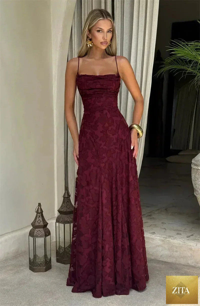 Femstylo spaghetti strap backless maxi dress for women, featuring off-shoulder, sleeveless lace-up design, perfect for evening or party wear.