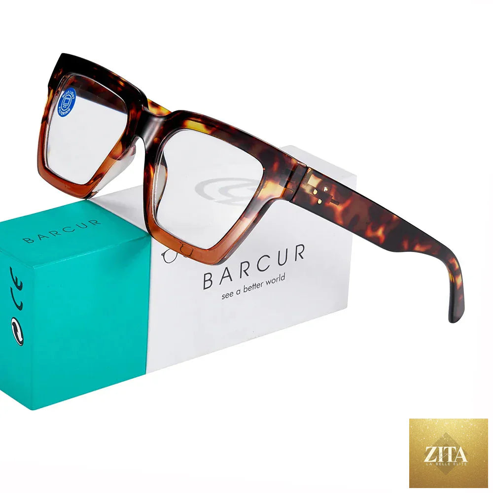 Stevvex leopard pattern reading glasses for women and men with clear prescription lenses, stylish rectangular design, and personalized gift box.