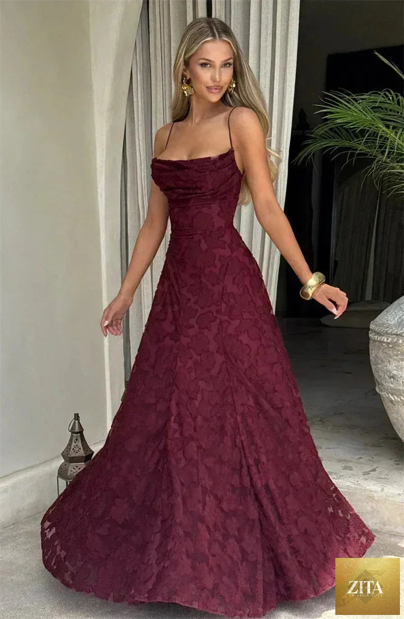 Femstylo spaghetti strap backless maxi dress for women, off-shoulder lace-up evening gown, perfect for parties and club nights.