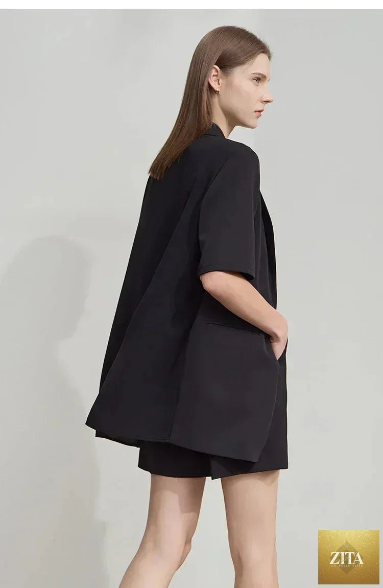 Femstylo Amii Women's Summer Blazer with notched lapel, contrast patchwork, short sleeves, and one-button closure.
