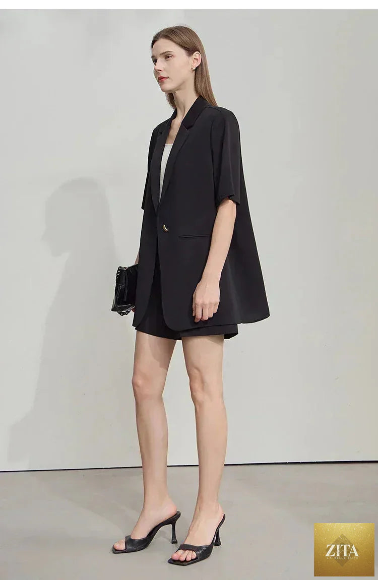 Femstylo Amii Women's minimalist summer blazer with notched lapel, contrast patchwork, short sleeves, and one button design.
